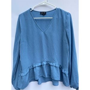 Beautiful modern blouse with pleating